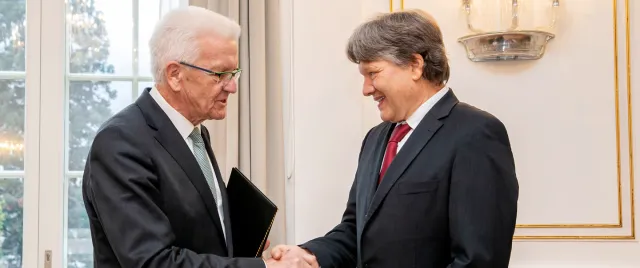 Kretschmann und Bosch Handschlag